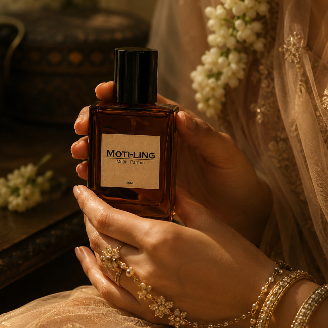 Lady holding Earthling Intense Long Lasting Motia Perfume